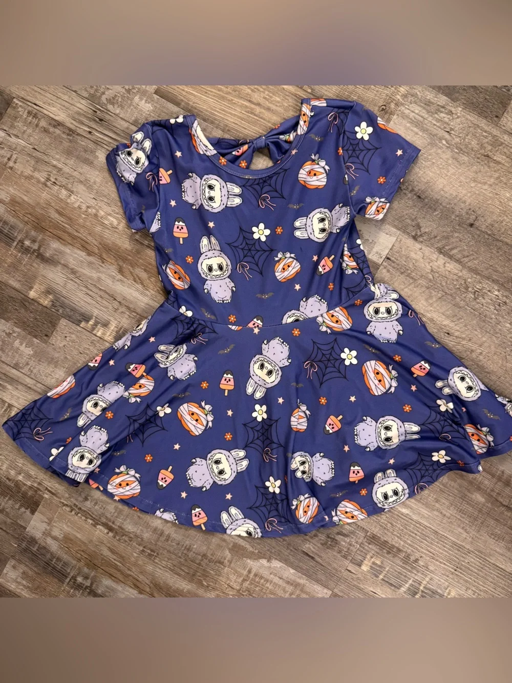 A bee bug boutique labubu inspired Halloween peplum size 8